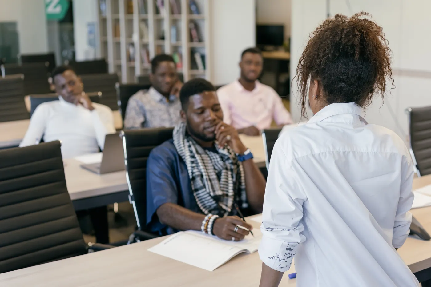 Professionals taking part in a group training discussion